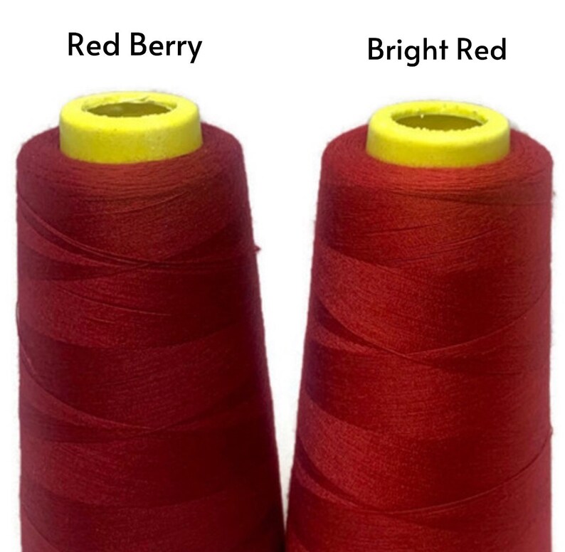 May include: Two spools of red thread, one labeled "Red Berry" and the other labeled "Bright Red".