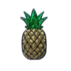 Può includere: Un toppa a forma di ananas con paillettes dorate e verdi. L'ananas è bordato di nero.