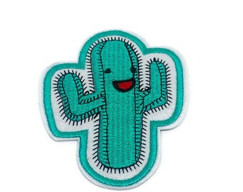 May include: A green embroidered cactus patch with a smiling face and white stitching around the edges.
