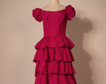 Magenta vintage puff sleeved corsetted ruffled gown