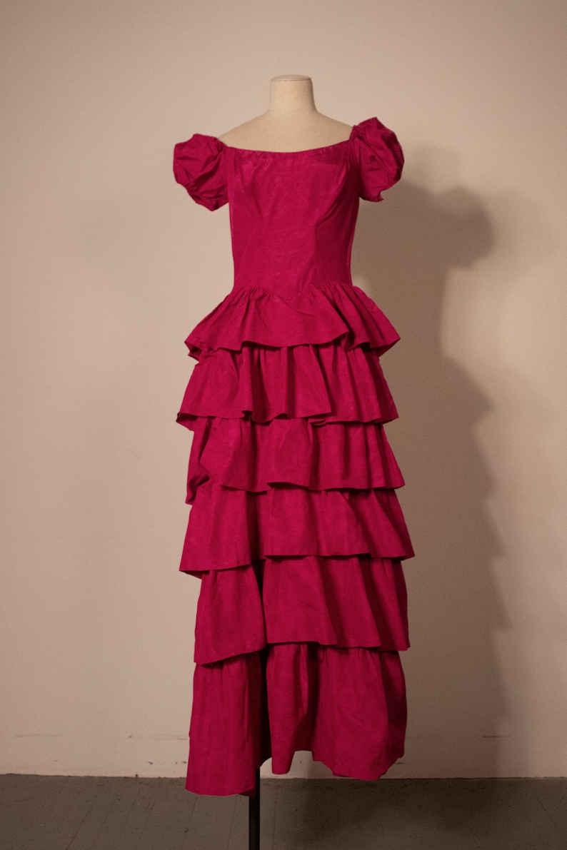 Magenta vintage puff sleeved corsetted ruffled gown image 1