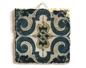 Photography in Art Nouveau design made of travertine stone tile, with hook for hanging