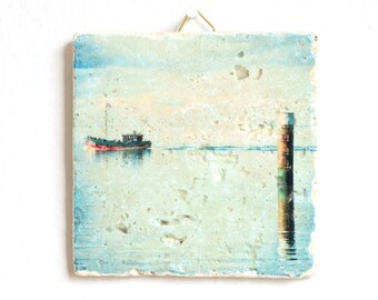 Sylt retro fishing boat made of travertine stone tile, with hook for hanging