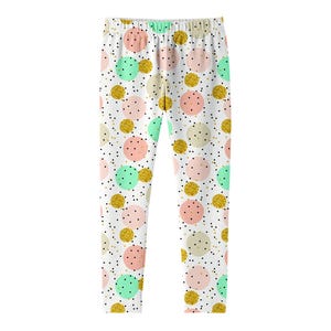 K&ouml;nnte beinhalten: Leggings mit wei&szlig;em Hintergrund und einem sich wiederholenden Muster aus Punkten in zartem Rosa, Mintgr&uuml;n, Beige und Goldglitzer. Das Design enth&auml;lt kleine schwarze Sprenkel, die &uuml;ber den Stoff verteilt sind und ein festliches, buntes Aussehen erzeugen.