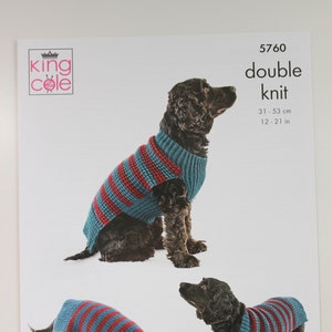 May include: Knitting pattern for a dog jumper, featuring a brown dog wearing a blue and red striped jumper. The pattern is called "Double Knit" and is from King Cole, pattern number 5760. The jumper is for a dog with a chest size of 31 to 53 cm.