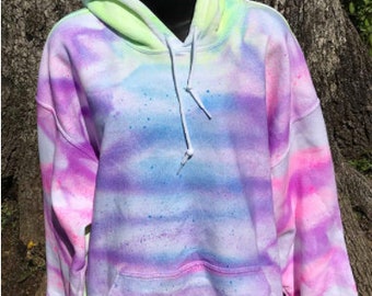 Sudadera unisex con capucha y efecto tie-dye arcoíris