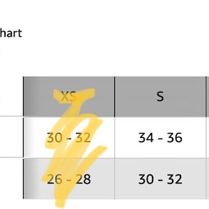 May include: A size chart for Hanes clothing in US regular sizes. The chart shows chest and waist measurements in inches for sizes XS, S, and M.