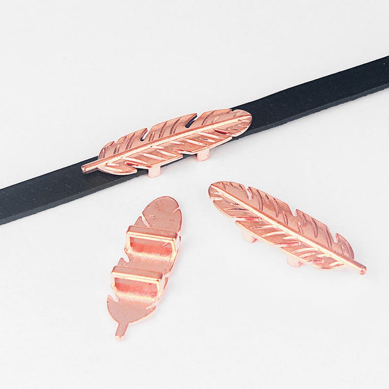 dune rose gold sliders