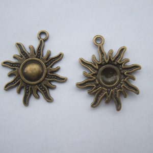 10 Antique Bronze Sun Charms  28x25mm