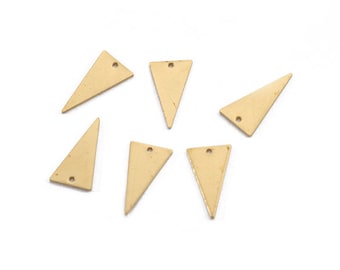 May include: Seven gold-colored triangle-shaped metal charms with a hole at the top.