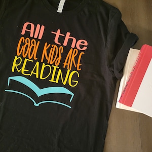 All The Cool Kids are Reading Graphic Tee