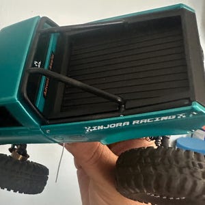 John added a photo of their purchase