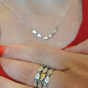 Sabina added a photo of their purchase