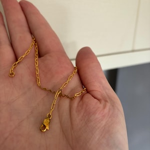 Customer photo, Cursive Name Necklace