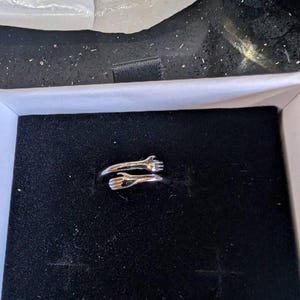 Tina added a photo of their purchase