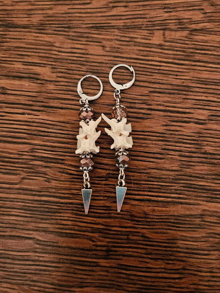 Exquisite Victorian-Era Inspired Coiled Rattlesnake Vertebrae Dangling, Earrings with Intricate Metalwork and Antique Brass Finish