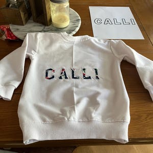 Lou added a photo of their purchase