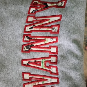 Caitlin added a photo of their purchase