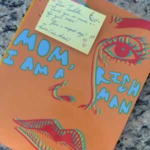 Isabella added a photo of their purchase