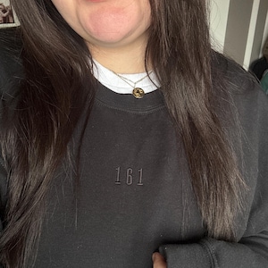 Alexandra added a photo of their purchase