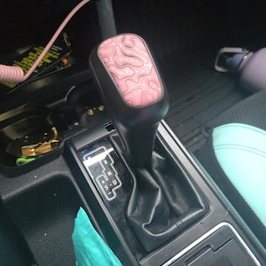 Carmela added a photo of their purchase