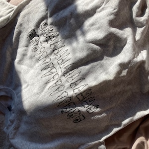Sidney added a photo of their purchase