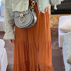 Alexandra added a photo of their purchase