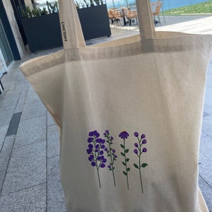 Alicia added a photo of their purchase