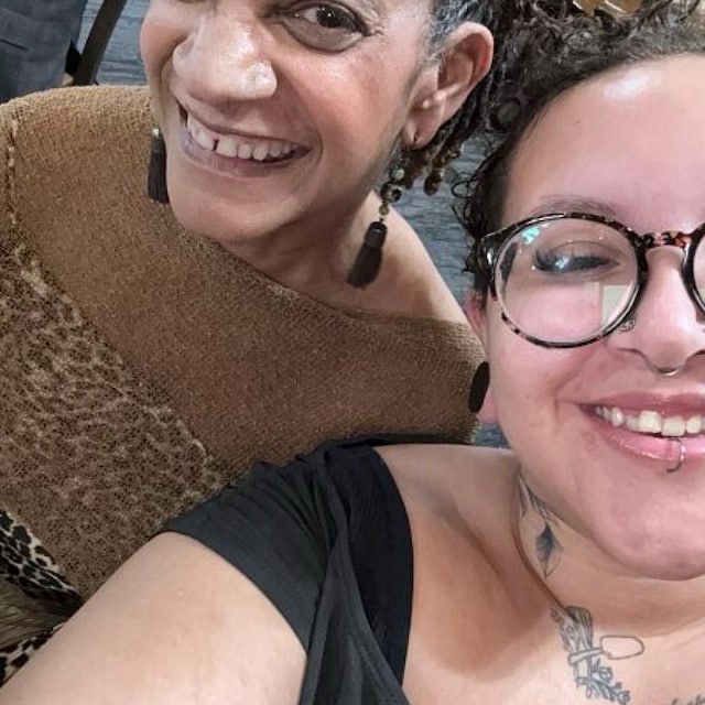Karen wearing the bronze Prema Poncho
