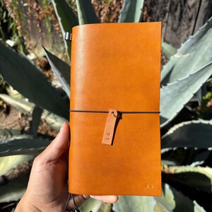 Tatiana added a photo of their purchase