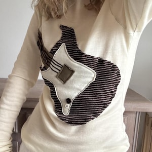 Nadia added a photo of their purchase