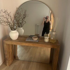 Ellie added a photo of their purchase