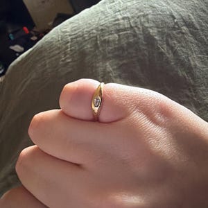 Sarah added a photo of their purchase