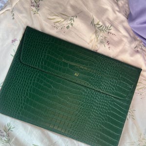 Aisha added a photo of their purchase