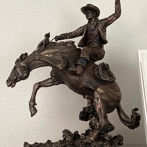 Cowboy Statue Figurine.wild Rodeo Ride. the Bronco Buster