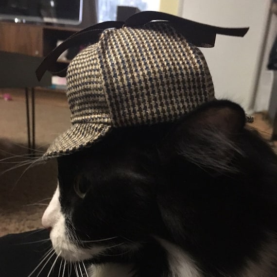 Customer photo of a pet with the Sherlock Holmes Deerstalker Houndstooth Hat for