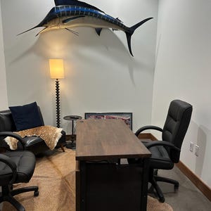 Lisa added a photo of their purchase