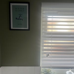 Sarah added a photo of their purchase