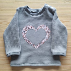 Silvia added a photo of their purchase