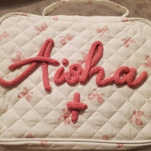 Aisha added a photo of their purchase