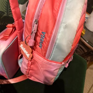 Tamar added a photo of their purchase