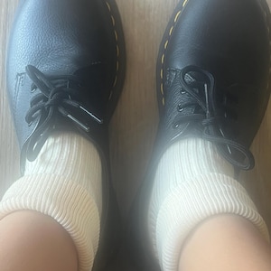 Kayla added a photo of their purchase