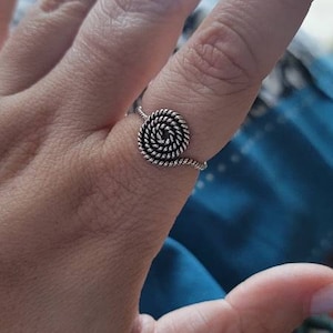 Aline added a photo of their purchase