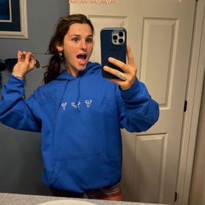 Lauren added a photo of their purchase