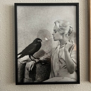 crow lighting cigarette Tippi Hedren Having Her Cigarette Lit by a Crow