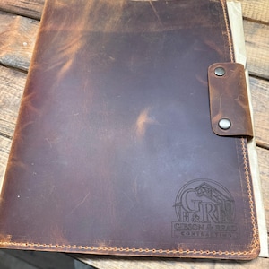 Laura added a photo of their purchase