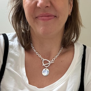 Christina added a photo of their purchase