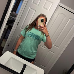 Jenny added a photo of their purchase