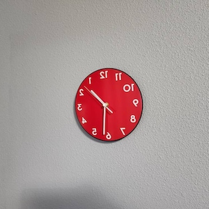 justa crimen ritmo Reloj de pared inverso Negro redondo Reloj divertido - Etsy España