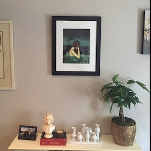 Gloria added a photo of their purchase